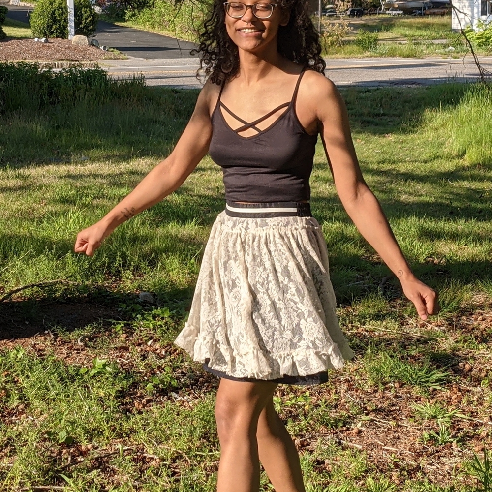 Lacy white skirt w/attached black slip